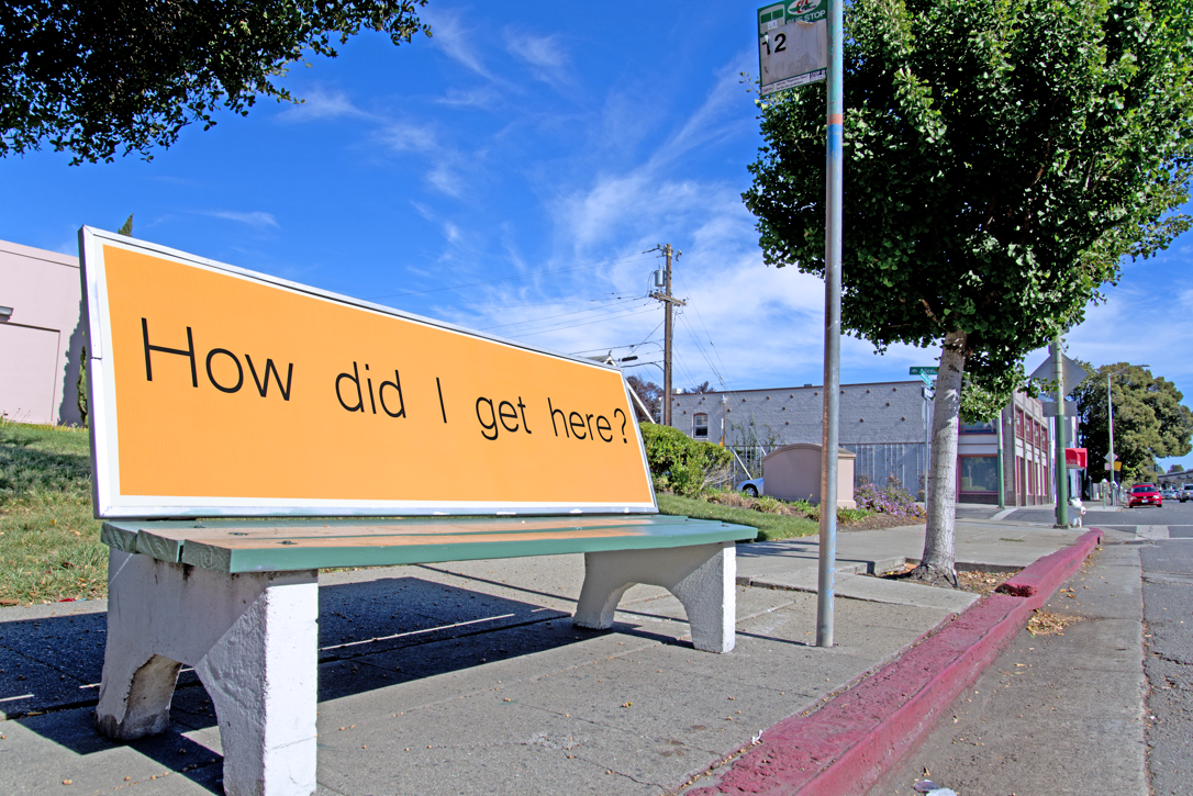 howdid Outdoor sculpture Bench Mark by Seyed Alavi, transforming a functional bench into a conceptual reflection on value, place, and human presence.